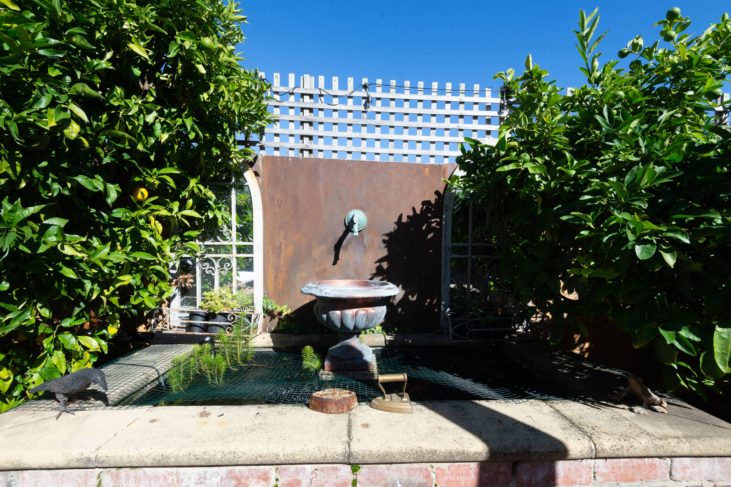 View of courtyard water feature. Photo: Oliver Berlin.