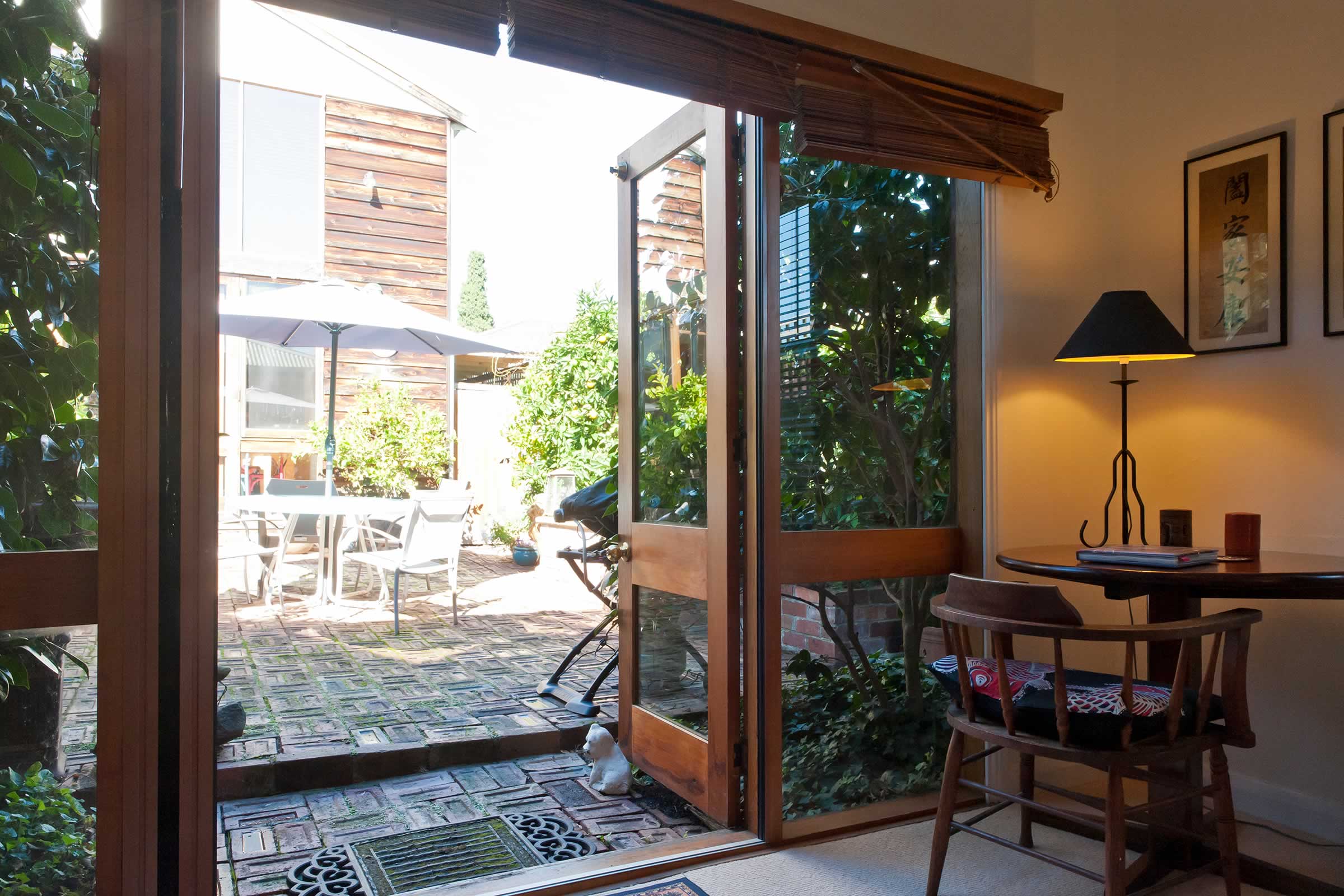 View of courtyard from bedroom. Photo: Oliver Berlin.