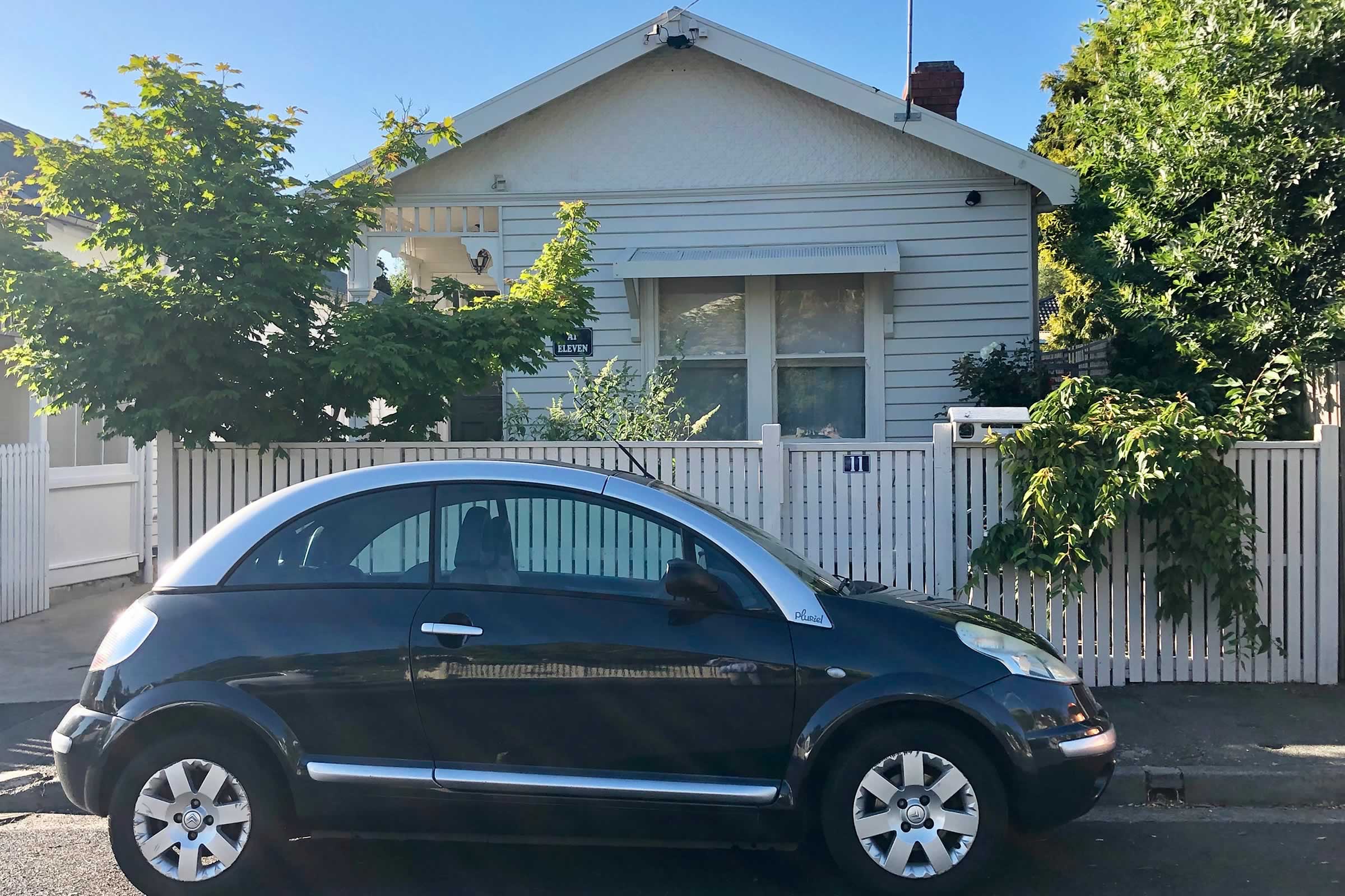 Street view with car. Photo: At Eleven.